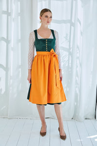 Das stilvolle Hingucker-Dirndl in traditionellen Grüntönen mit auffälliger orangener Schleife! Die Charity-Kollektion GOLDHIRSCH x RETLA ist inspiriert von bayerischer Lebensart und einem Hauch italienischem Sommerflair.